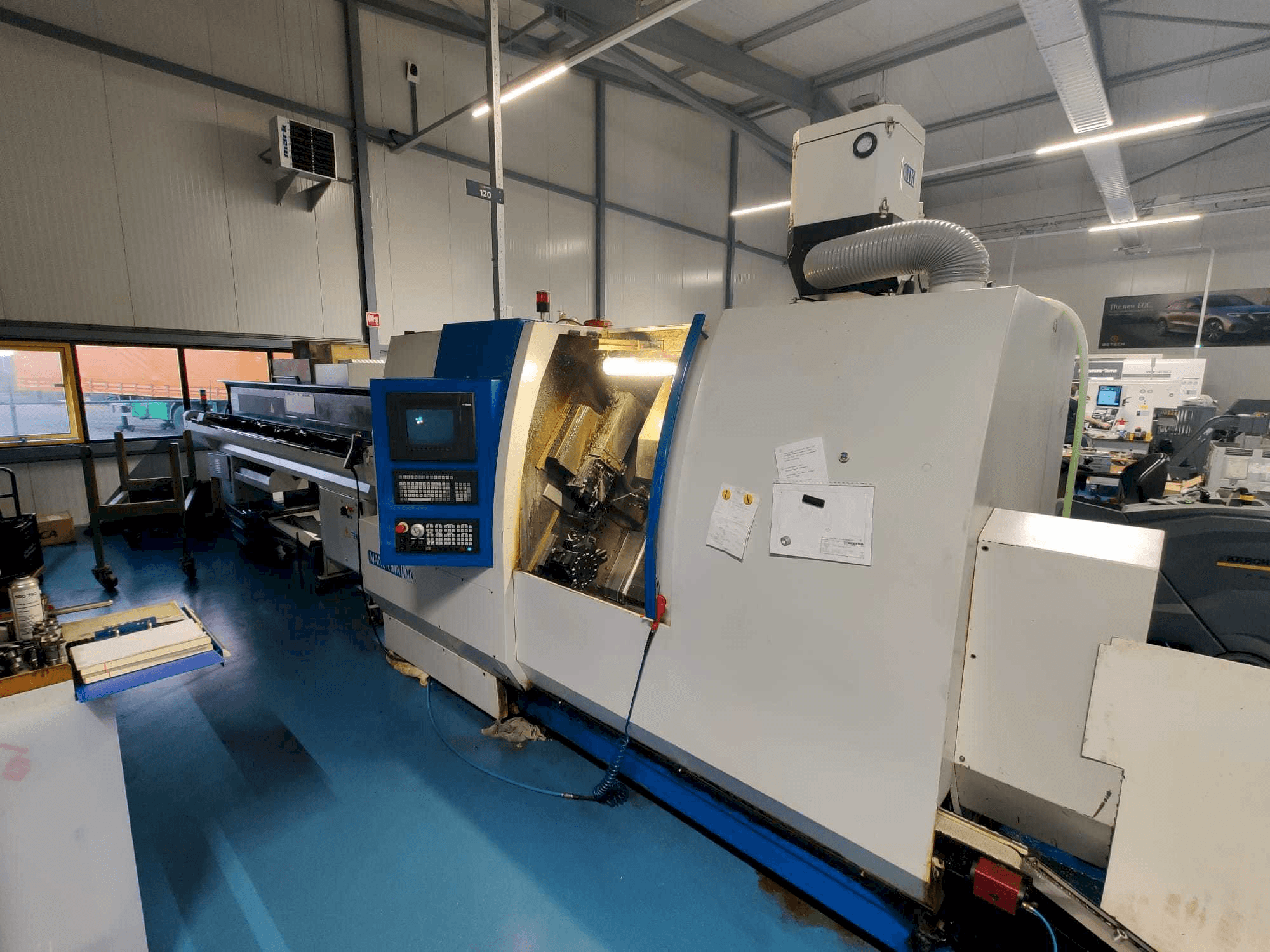 Front view of Manurhin K'MX XL 32 machine