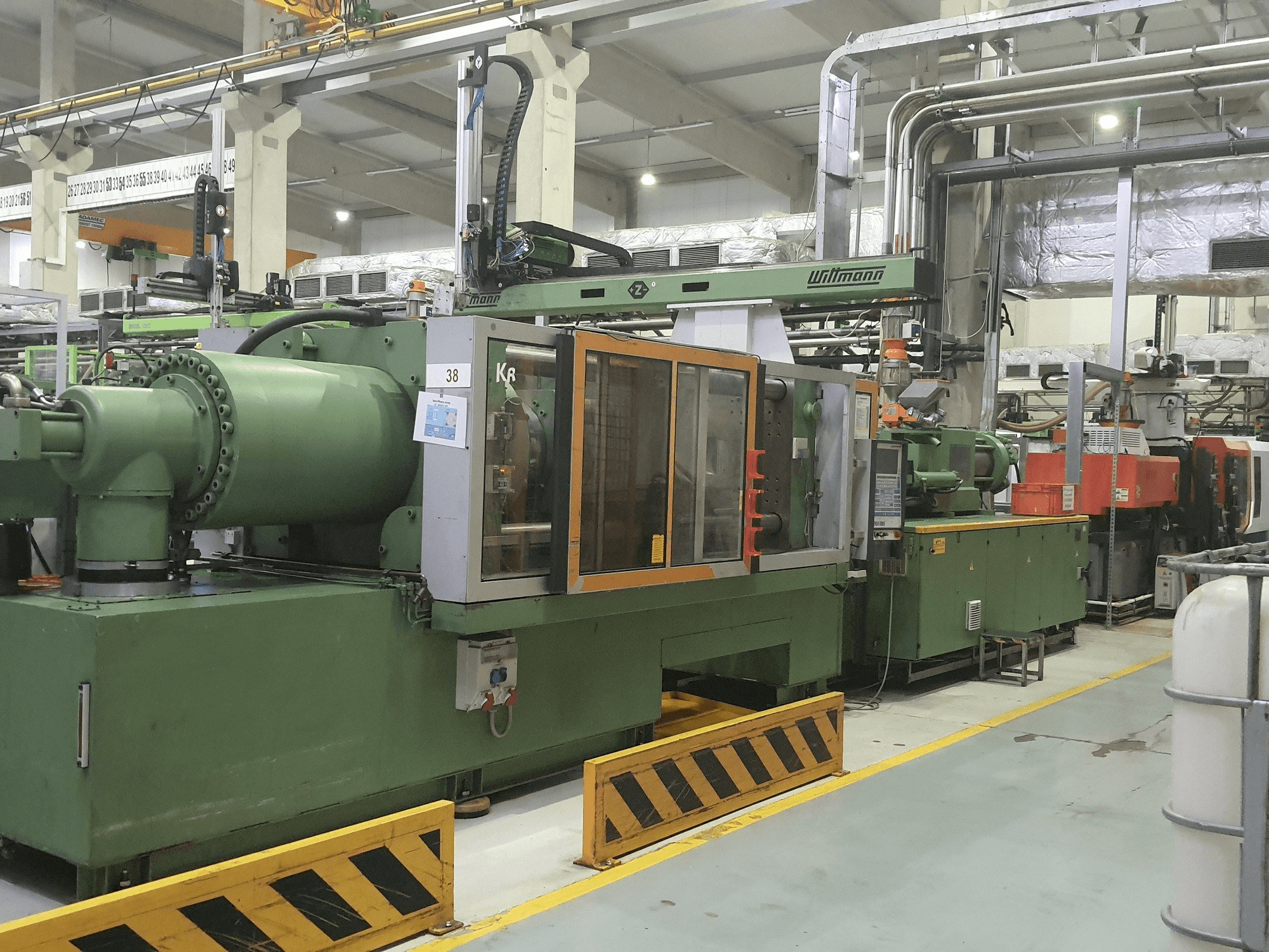 Front view of Krauss Maffei 420-3000 machine