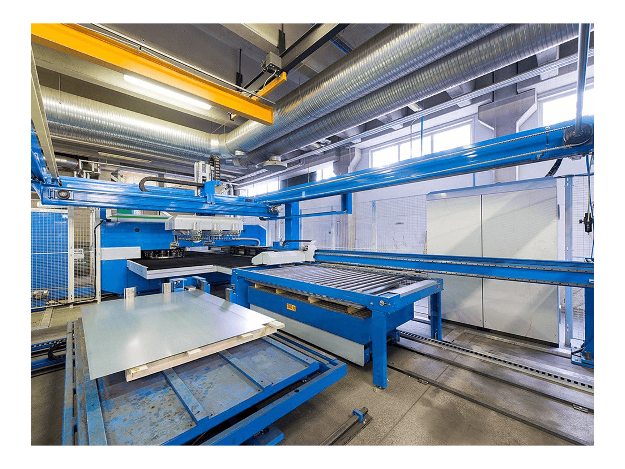 Left side view of Finn-Power E 5 Lui machine