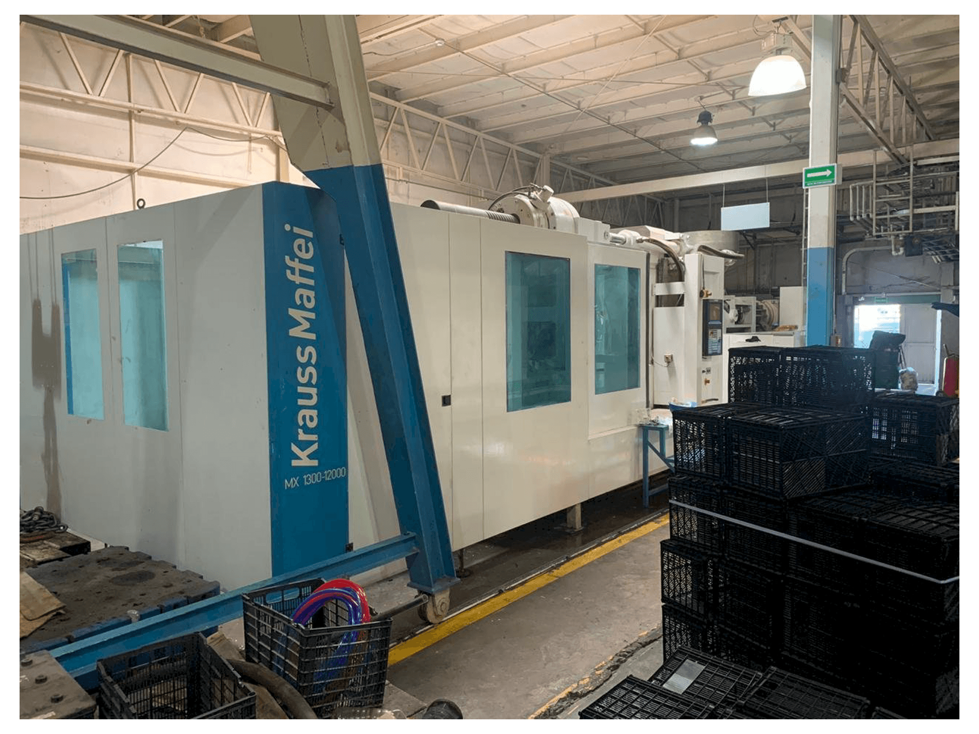 Front view of Krauss Maffei 1300-12000 MX machine