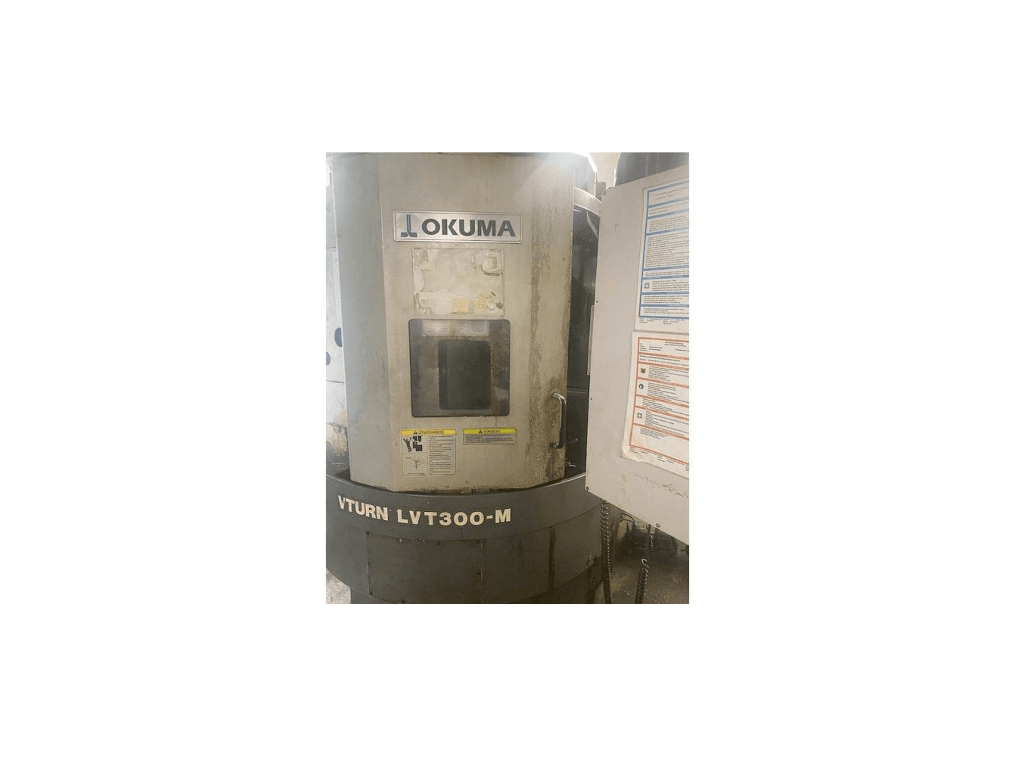 Front view of Okuma LVT300M machine